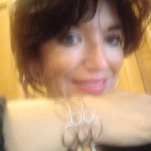 Abstract copper cuff with circle motif